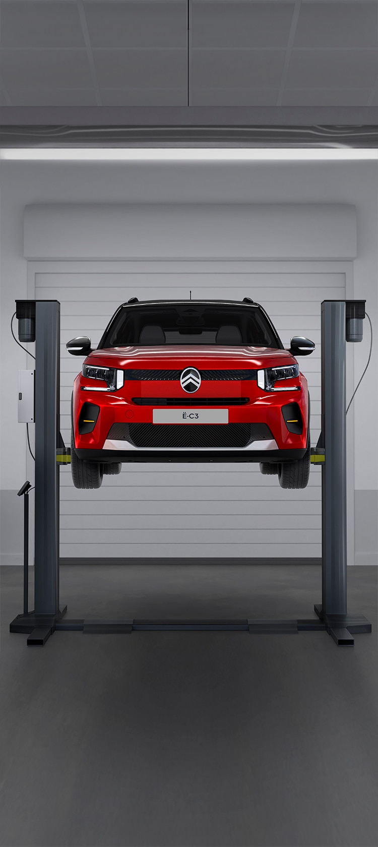 C3 en taller de reparación sobre fondo gris