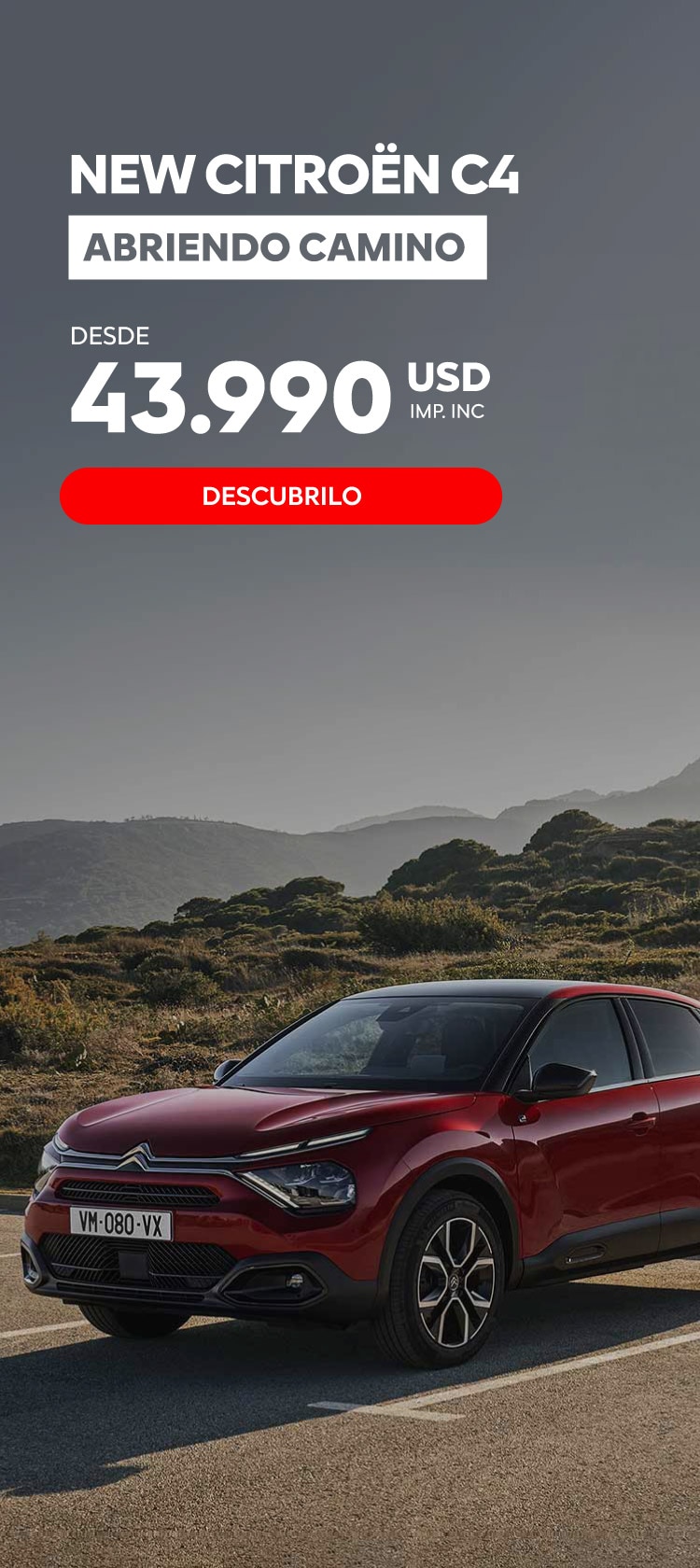new citroen c4 rojo con montañas de fondo